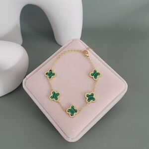 Stainless steel gold tone green four leaf clover bracelet